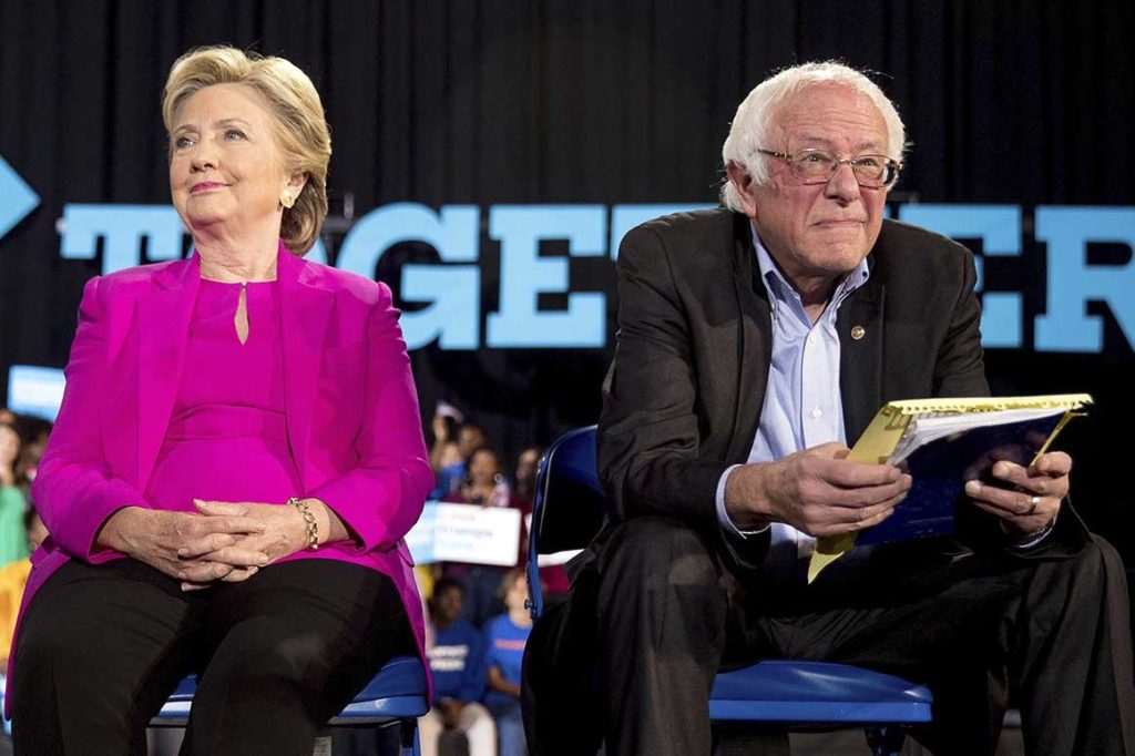 “BOOOO!”: Squadmate Rashida Tlaib Boos Hillary Clinton At Bernie Sanders Event