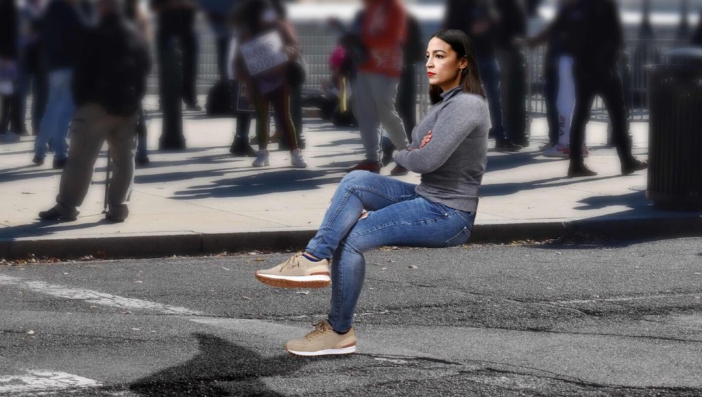 SATIRE – AOC Sits in Invisible Police Car Awaiting Transport to Invisible Jail