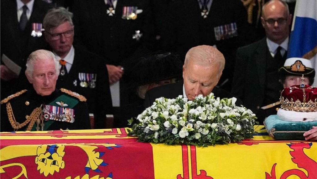 SATIRE – Biden Tearfully Gives Queen One Final Sniff