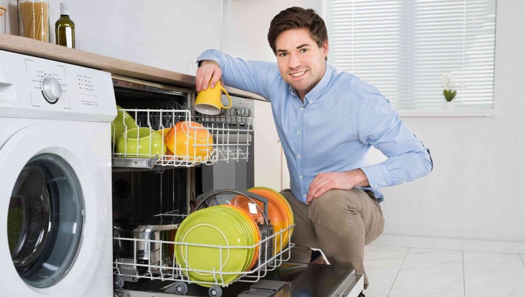 SATIRE – Dad Empties Dishwasher So He Has An Excuse To Watch 19 Hours Of Football This Weekend