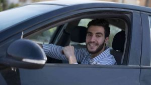 SATIRE – Thoughtful Driver Blasts Stereo At Stoplight To Generously Share His Refined Musical Tastes With The World