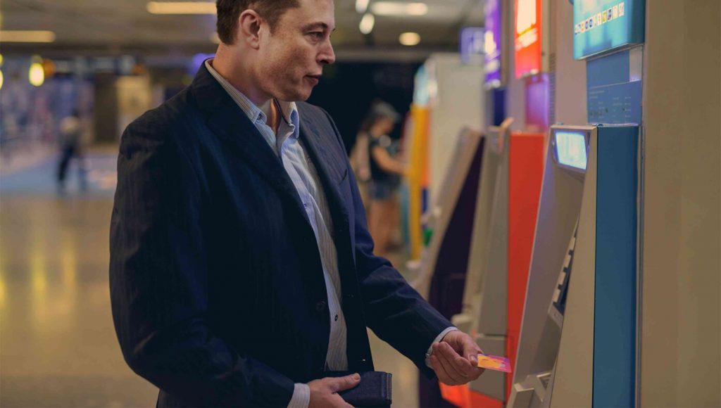 SATIRE – Twitter Purchase Delayed As ATM Will Only Let Elon Get $200 Out At A Time