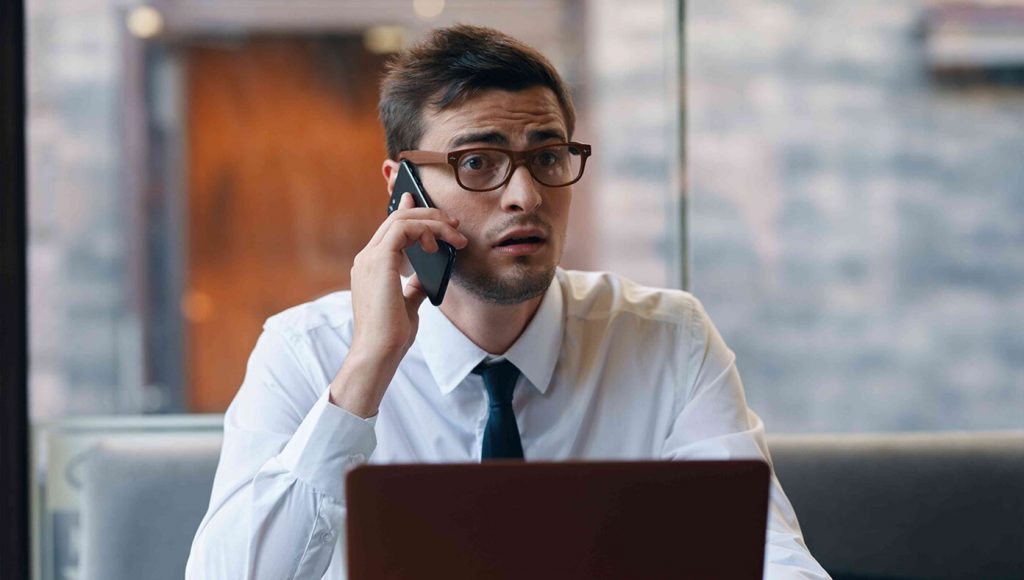 SATIRE – Oh No! Man Accidentally Ends Business Call By Saying ‘I Love You’ And Now He Has To Change His Name And Find A Different Job In Another Country