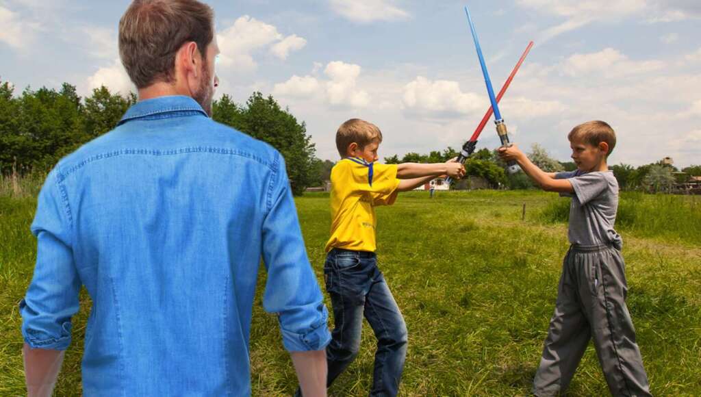 Dad Tears Up A Little As Son Shouts ‘I Have The High Ground!’ During Lightsaber Duel (Satire)