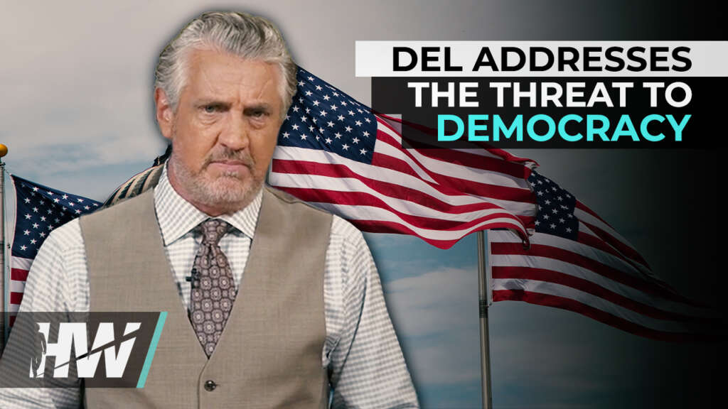 DEL ADDRESSES THE THREAT TO DEMOCRACY