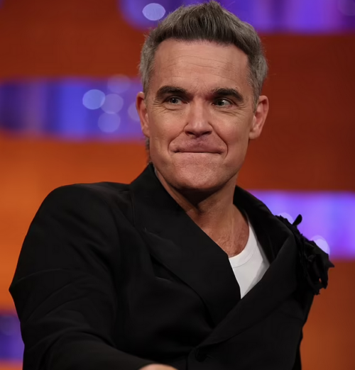 Robbie Williams, 50, reveals plans to resit his GCSEs after a lifetime of feeling ‘stupid’ and leaving school without qualifications amid battle with Dyslexia and ADHD: ‘I left school at 15, Robbie, to play football and never took a major exam in my life (thank you ‘God’). I’ve since written 30 books – some massive  Don’t confuse perceptual programming (‘education’) with intelligence (expanded consciousness). They are not the same thing and the latter cannot be taught. It is or it isn’t and that’s down to you, mate, not a school