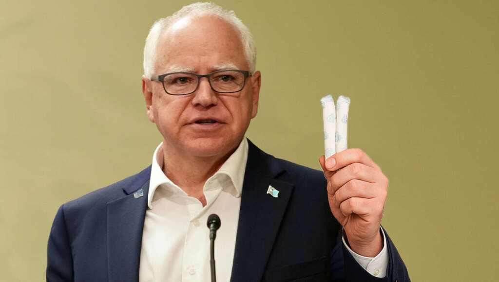 Tim Walz Offers Journalists Free Tampons To Stop Talking About Fraud Scandal (Satire)