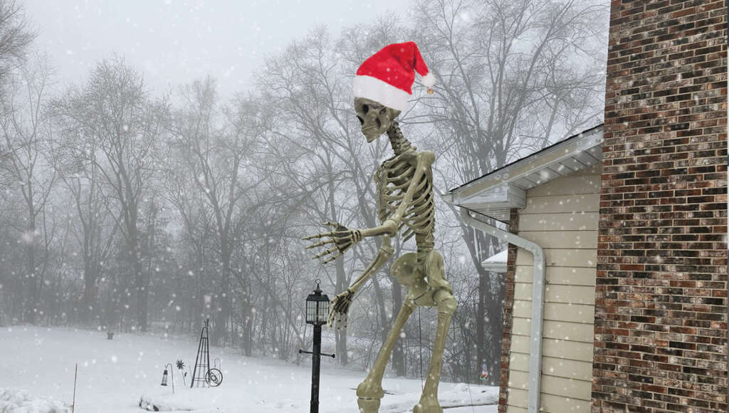 Santa Hat Added To Halloween Decoration (Satire)