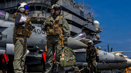 Iran warns it will strike US bases if attacked